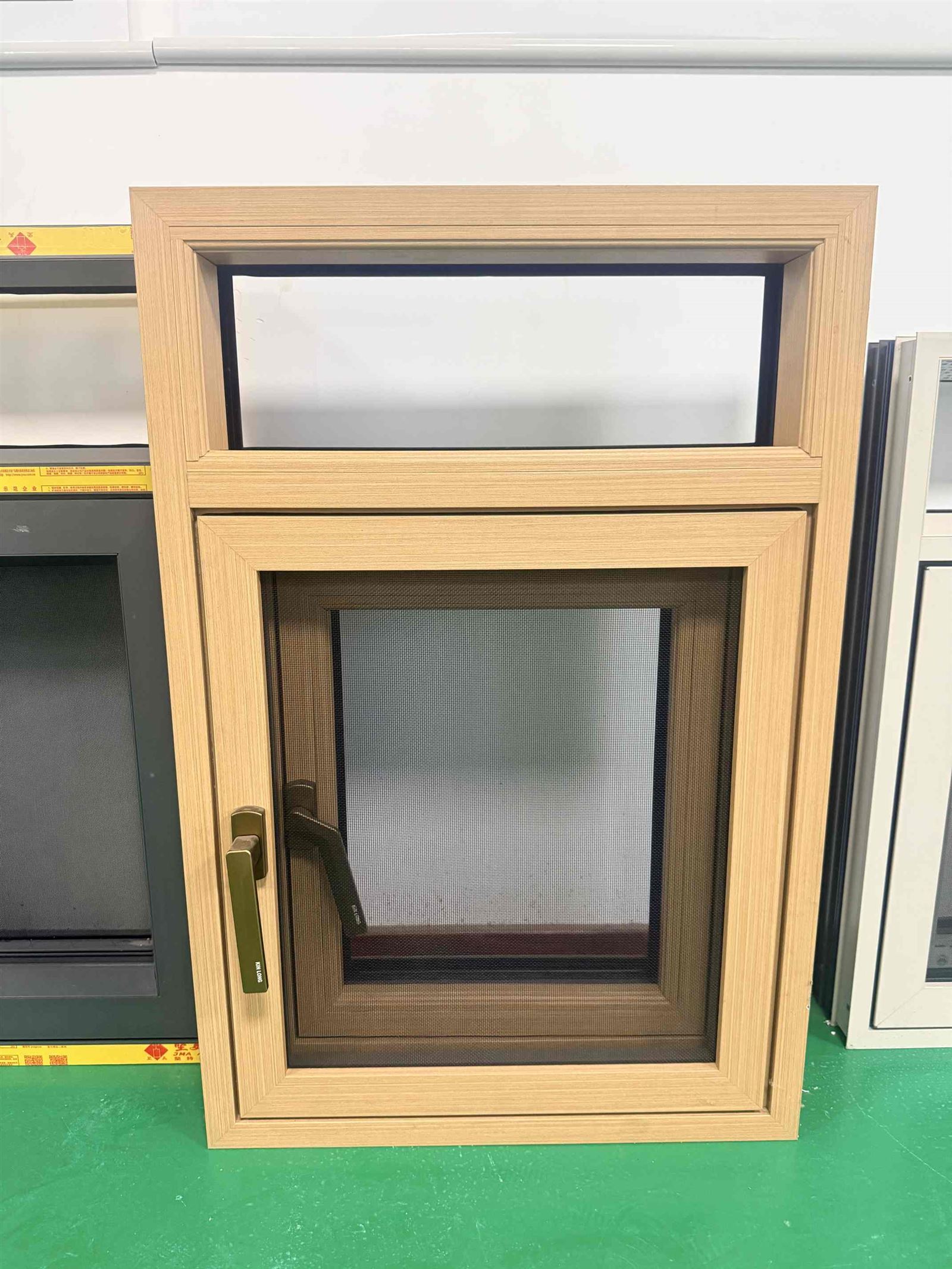Australian customer and SGL team discussing house window and door drawings during a factory visit Australian customer and SGL team discussing house window and door drawings during a factory visit